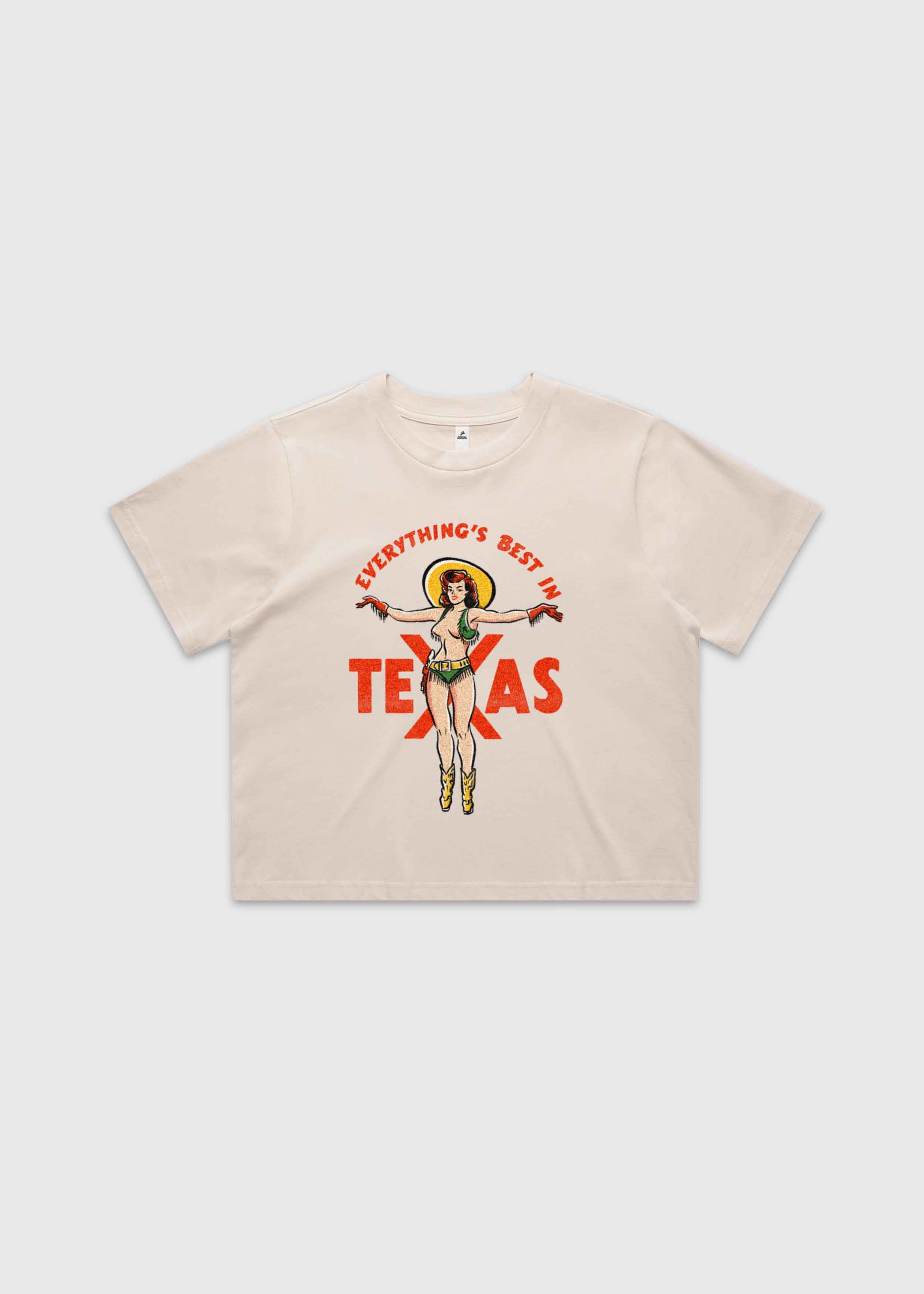 Bone cropped t-shirt featuring a retro cowgirl illustration with the text “Everything’s Best in Texas,” premium Western graphic tee by America Provisions.