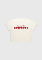 Ecru cropped t-shirt with bold red “Here For The Cowboys” Western graphic, structured boxy fit, heavy cotton fabric, America Provisions apparel product photo on a neutral background.