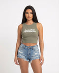 Eucalyptus crop top with America Provisions logo on. Blonde model is wearing the crop top and denim shorts