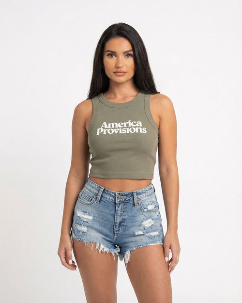 Eucalyptus crop top with America Provisions logo on. Blonde model is wearing the crop top and denim shorts
