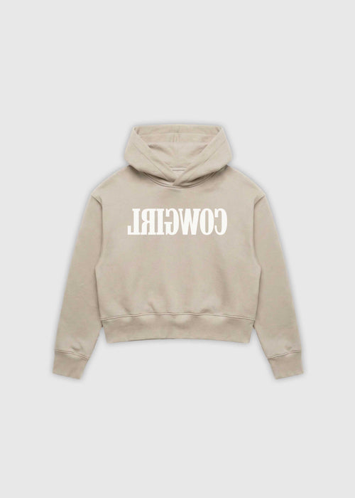 Reverse Cowgirl Hoodie. A cropped Bone hoodie with 'COWIRL' text on a white background
