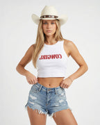 Woman wearing a white crop top with red text saying Cowgirl backwards and red high-waisted bikini bottoms on a white background